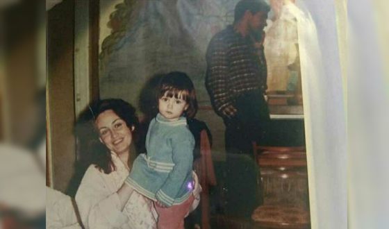 Анна Адамович в детстве с родителями
