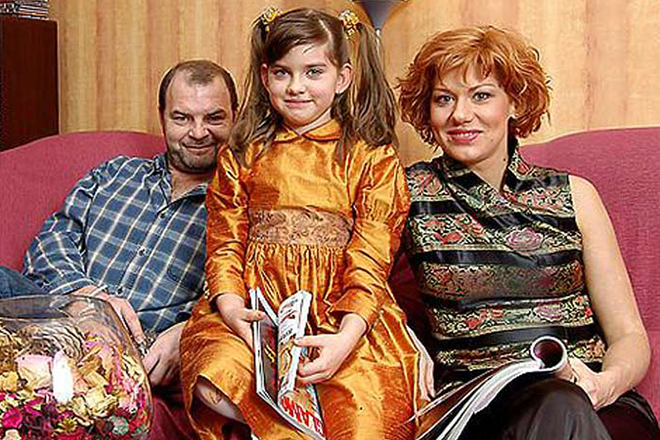 Елена Бирюкова и Алексей Литвин с дочерью