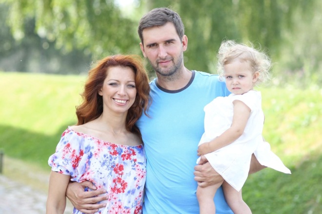 Юлия Коган с мужем и дочерью