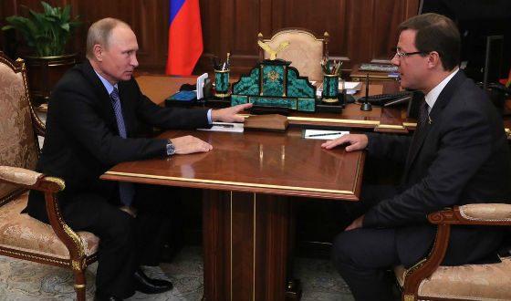 На фото: Дмитрий Азаров и Владимир Путин